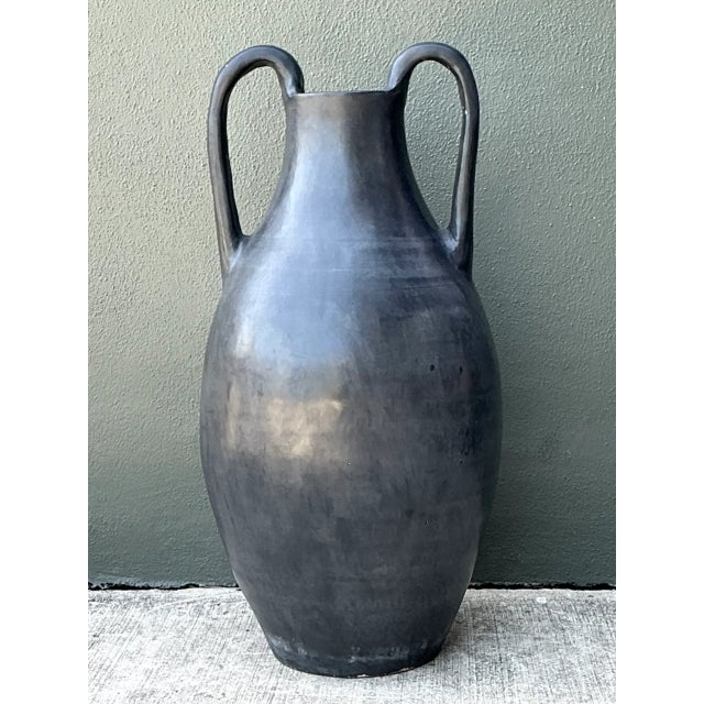 Rooted in ancient Grecian pottery traditions and classical symmetry, this 32.75-inch tall vintage floor vase features an...