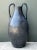 Rooted in ancient Grecian pottery traditions and classical symmetry, this 32.75-inch tall vintage floor vase features an...