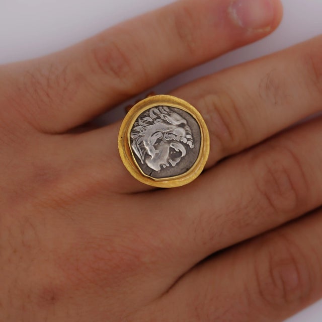 22K carved yellow gold ring weighing 20.3 grams, featuring a striking Alexander III the Great Roman coin, in ring size...