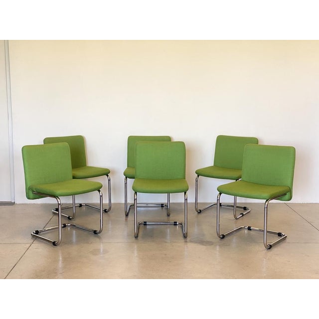 Set of 6 chairs from the 70s, chromed steel and green fabric (small imperfections due to wear)
