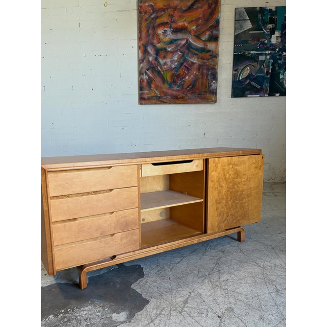 Newly refinished mid century modern dresser by Edmund Spence, featuring a sculpted waterfall base, eight drawers that move...