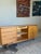 Newly refinished mid century modern dresser by Edmund Spence, featuring a sculpted waterfall base, eight drawers that move...