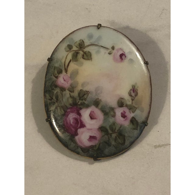 This beautiful handpainted Antique Victorian Porcelain Brooch with Pink Roses will be a lovely and unique accent to your...