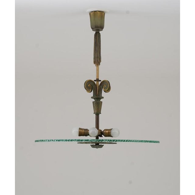 Swedish art deco chandelier by einar bäckströms metallvarufabrik, 1940s a striking swedish art deco chandelier crafted by...