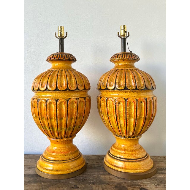 This striking pair of vintage table lamps exudes the bold, textural energy of Mid-Century Modern Mediterranean design....