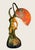 15” high, a spectacular and rare nautilus shell lamp, golden Art Nouveau lady with stem that comes up from the rear which...
