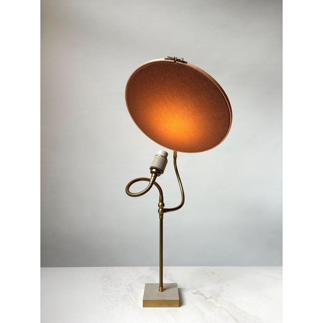 No. 32 table lamp by sander bottinga dimensions: d 31 cm x w 40 cm x h 140 cm materials: brass, wood, stone color hand-...