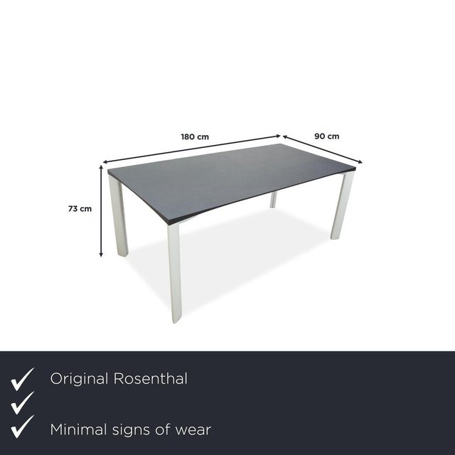 The Rosenthal dining table in dark gray impresses with its elegant and modern appeal. The dark gray tabletop lends the...