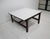 A very well crafted teak wood coffee table with flipping top , one side teak and the other side in white Laminate . This...