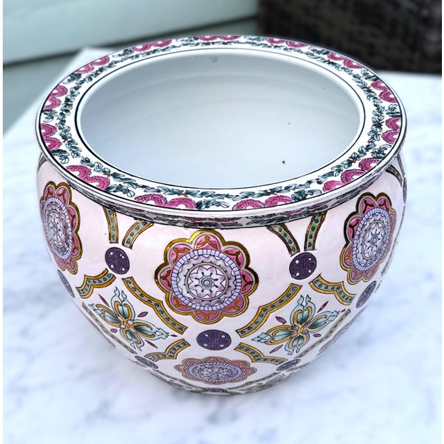 A unique chinese export planter made in the late 20th century combining tradtional chinese craftsmanship with a modern...