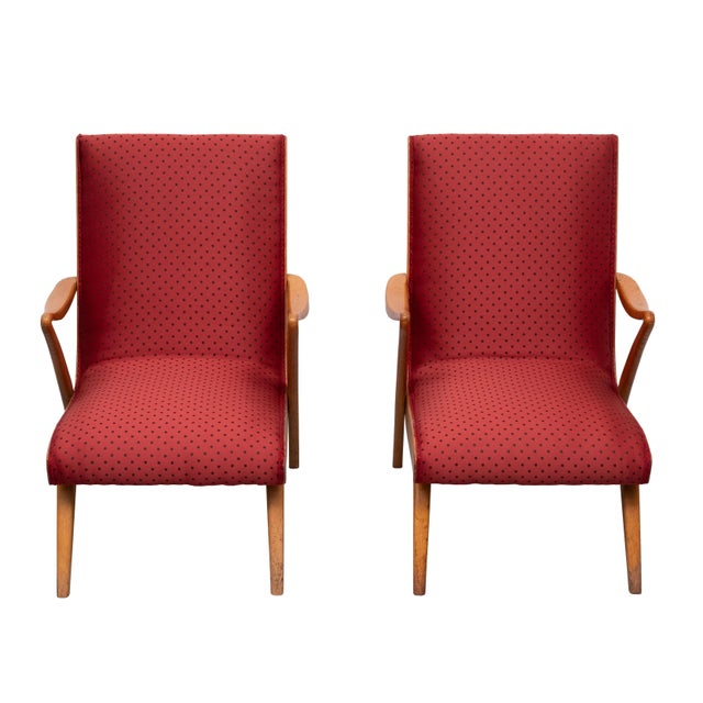 Very nice curved solid beech wood frames with brand-new red silk polka dot upholstery. Low seating, typical of the 1950s.