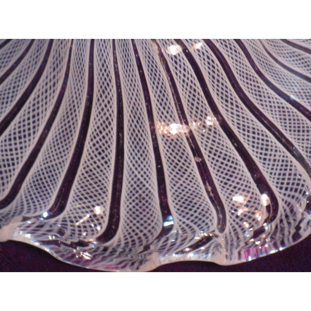 This Venetian glass bowl with a white latticinio design is a small footed piece that is perfect for all occasions. Made in...