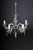 20th century beautiful Maria Theresia chandelier / lamp. Brass, chased. High baluster-shaped body. Five-armed lights,...