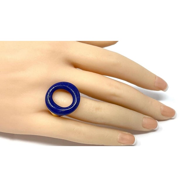 Discover the elegance of the Tiffany & Co. Peretti Sevillana Lapis Lazuli ring, a stunning piece that marries the deep...