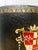 Impressive oval shaped Leather Waste Bin with gilt border trim on top and bottom, and especially nice painted Coat of Arms...