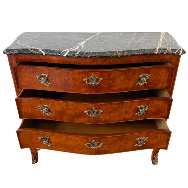 A striking vintage French Louis XV style bombe commode from Henredon's Villandry Collection, circa 1980s. Crafted with a...