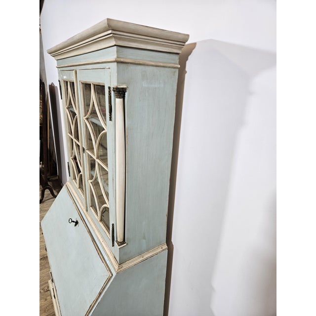 Antique Biedermeier secretary desk with a top, from the first half of the 19th century. A two-piece piece of furniture...