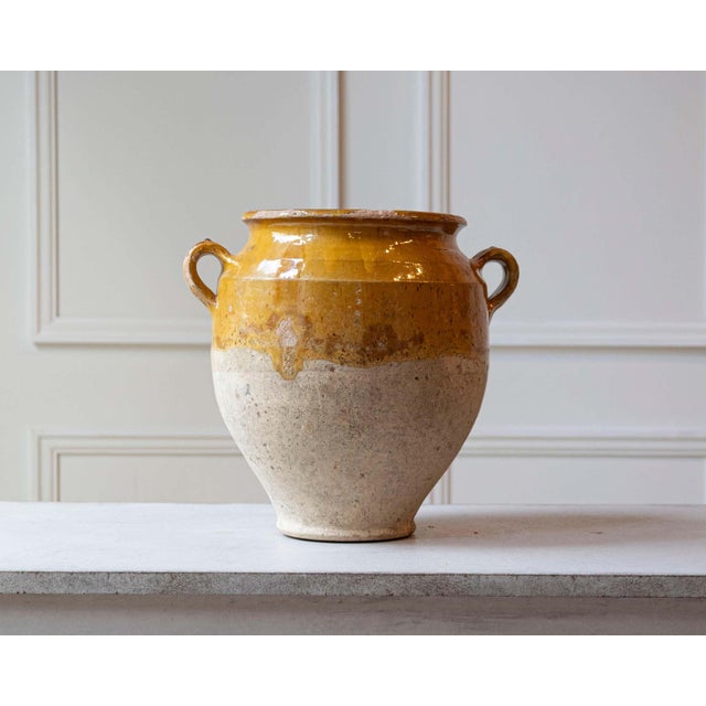 This 19th-century French confit pot is a radiant example of everyday rural pottery elevated by time and patina....