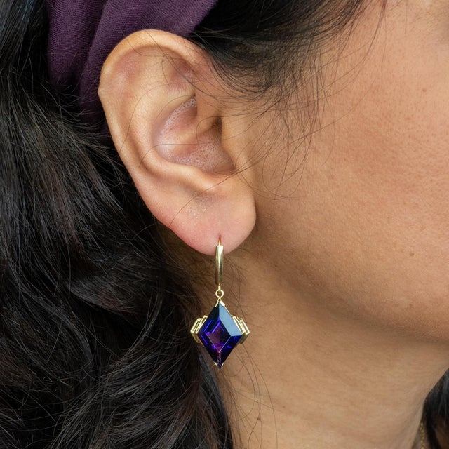 Bold 16 Ct Zambian amethyst kite earrings set in lustrous solid 14K gold. Statement 22x13mm studs that bring vibrant color...