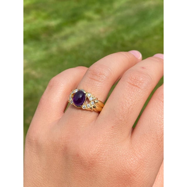 The Bealville: Purple Sapphire and Diamond Cocktail Ring. The ring features a medium dark vivid purple sapphire weighing...