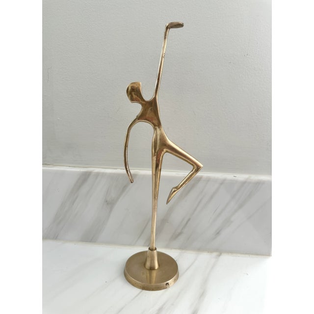 Beautiful mid century modern brass dancing figurine. Made in the 1970s