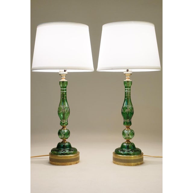 A brilliant and striking pair of Bohemian Art Glass Deco "Cut-Thru" design glass form with elaborate reticulating detailed...