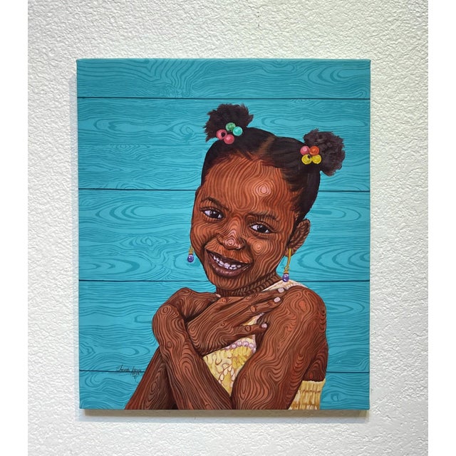 This artwork features a young girl with a joyful expression, her skin richly textured against a vibrant turquoise...