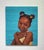 This artwork features a young girl with a joyful expression, her skin richly textured against a vibrant turquoise...