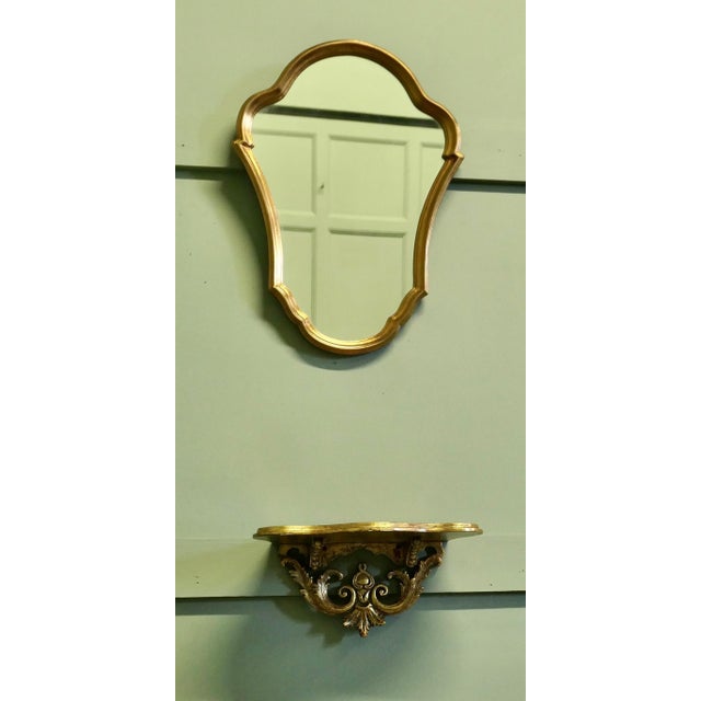 French Gilt Console Mirror with Matching Shelf This is a lovely unfussy piece, the mirror has a very attractive waisted...