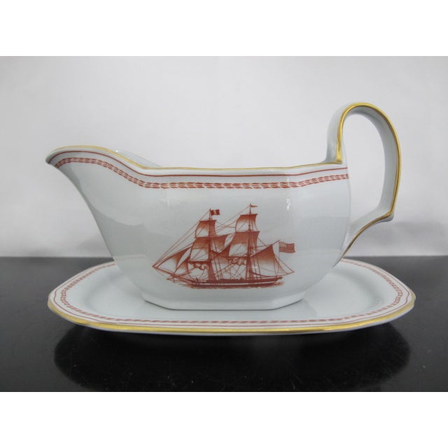 Classic Spode Copeland Trade Winds gravy boat with underplate (not attached). Red ship design at each side and gold gilt...