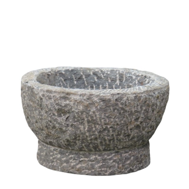 This vintage stone planter is hand carved out one piece of stone and hand chiseled by the locals. This naturally imperfect...