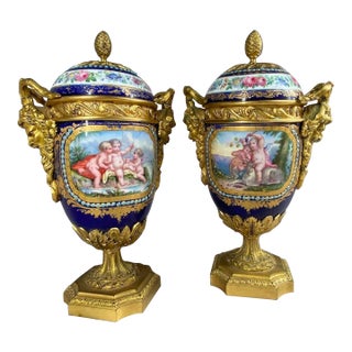 Pair of 19th Century French Sevres Porcelain and Ormolu Bronze Urns For Sale