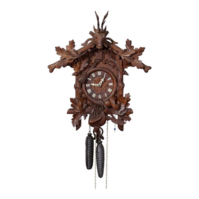 Antique Black Forest Carved Cuckoo Clock With Stag Head on Top For Sale
