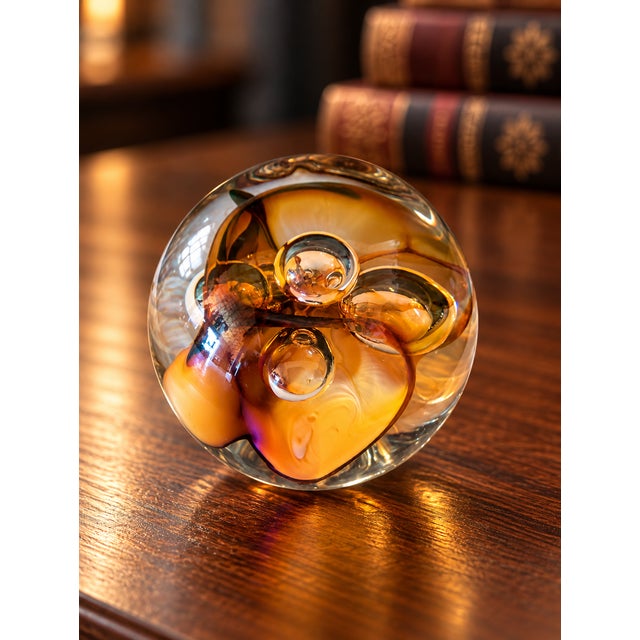 Beautiful vintage Langham Glass paperweight, handcrafted in England, featuring rich amber, golden honey, and warm caramel...