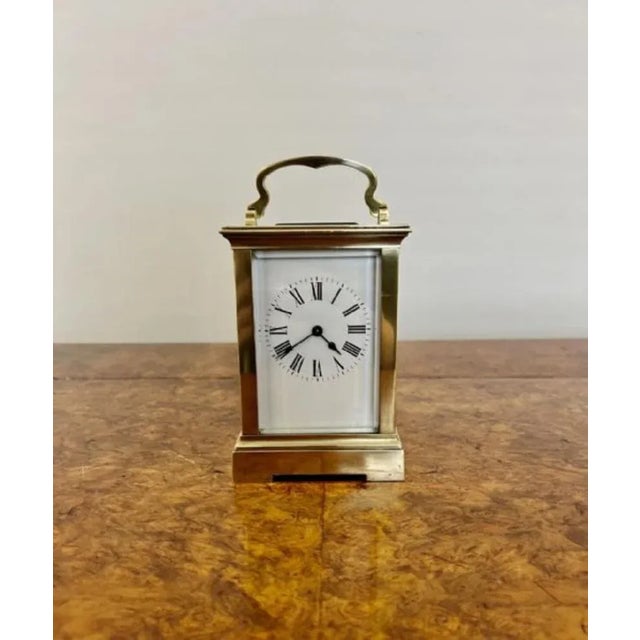 Large antique Victorian quality carriage clock having a quality large brass carriage clock with bevelled edge glass...