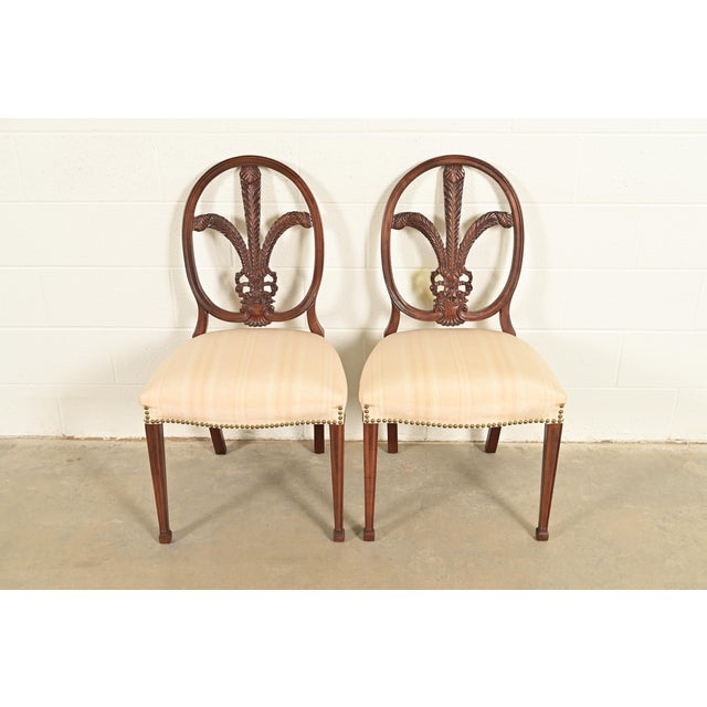 A gorgeous pair of antique French Regency Louis XVI style side chairs or dining chairs By Romweber USA, Circa 1930s Solid...