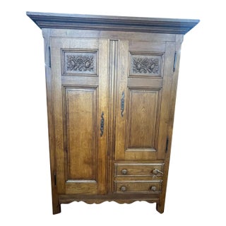 Antique French Provincial Oak Armoire With Carved Floral Panels For Sale