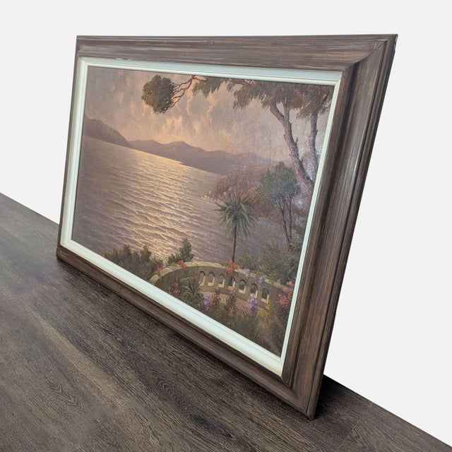This beautiful framed painting by J. Andre captures a peaceful Mediterranean sunset with mountains in the distance. The...