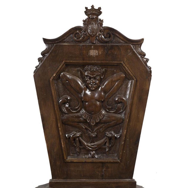 This pair of antique chairs is a beautiful original decorative object realized at the beginning of the 20th century. The...