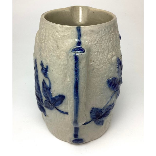 Antique Whites of Utica Stoneware Figural Pitcher or Jug with Blue Decoration. This piece is generally referred to as the...