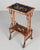 A 19th century French Japonisme Aesthetic Movement side table with bamboo frame and mother-of-pearl marquetry inlaid...