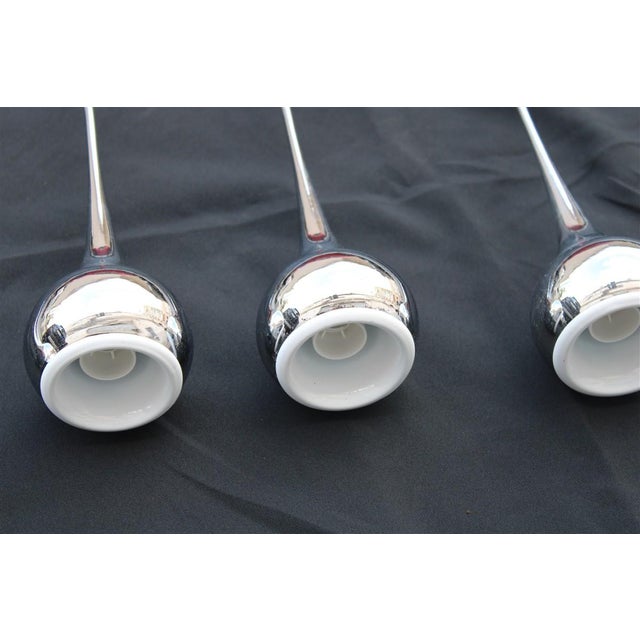 Minimal Trombetta Chandelier in Chromed Metal by Angelo Brotto for Esperia Trombetta, 1970s, in Very Good conditions....