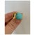 Stunning 18k gold Persian Turquoise ring. The center stone is a cabochon cut, and the band of the ring has a unique Mid...