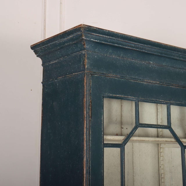 Wonderful late 18th century English glazed pine bookcase/ glazed cabinet. 1790. Shelves are adjustable. This piece will...