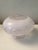 This is a vintage frosted glass ceiling light fixture shade featuring a raised clear glass floral or grape vine pattern....