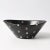 Black ceramic bowl with pink and white polka dot pattern. Designed by Aldo Londi for Bitossi in 1950s. Bowl has the famous...