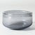 Beautiful, large glass bowl by Erik Höglund, in a cloud grey nuance. Air bubbles encapsulated in the glass create a...