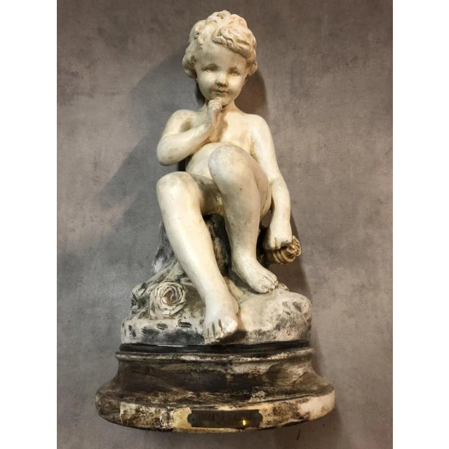 Sculpture en plâtre ‘’enfant au silence de Falconet’’