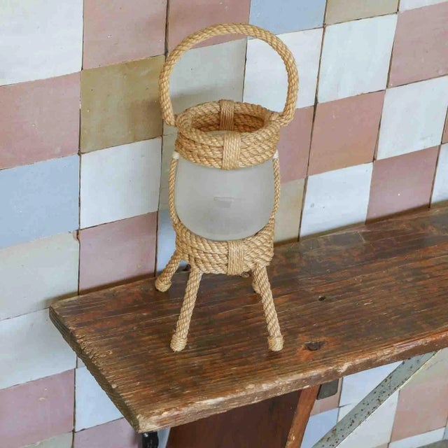 Petite rope lantern table lamp by Adrien Audoux & Frida Minet, France, 1950s. Coiled rope frame with 4 rope feet and top...