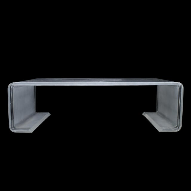 Monumental Lucite Greek Key Coffee Table – A striking and super rare statement piece. This oversized coffee table features...